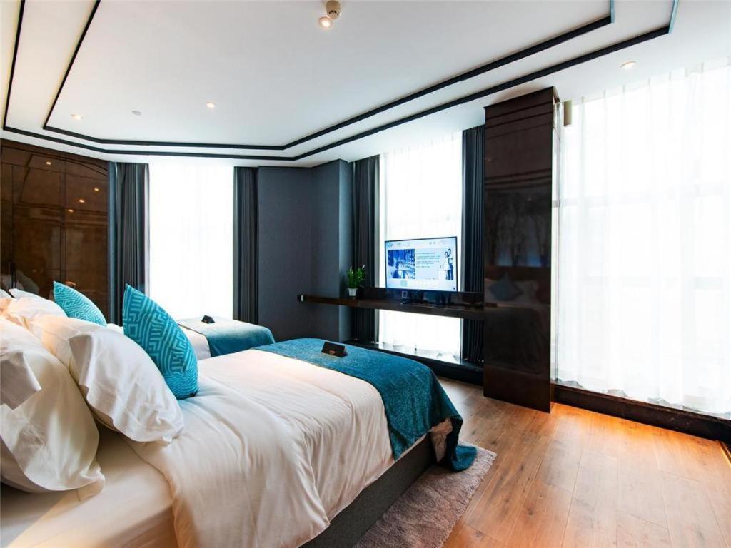 Xana Hotelle-Hotel Luzhou Baizitu Square Exterior foto