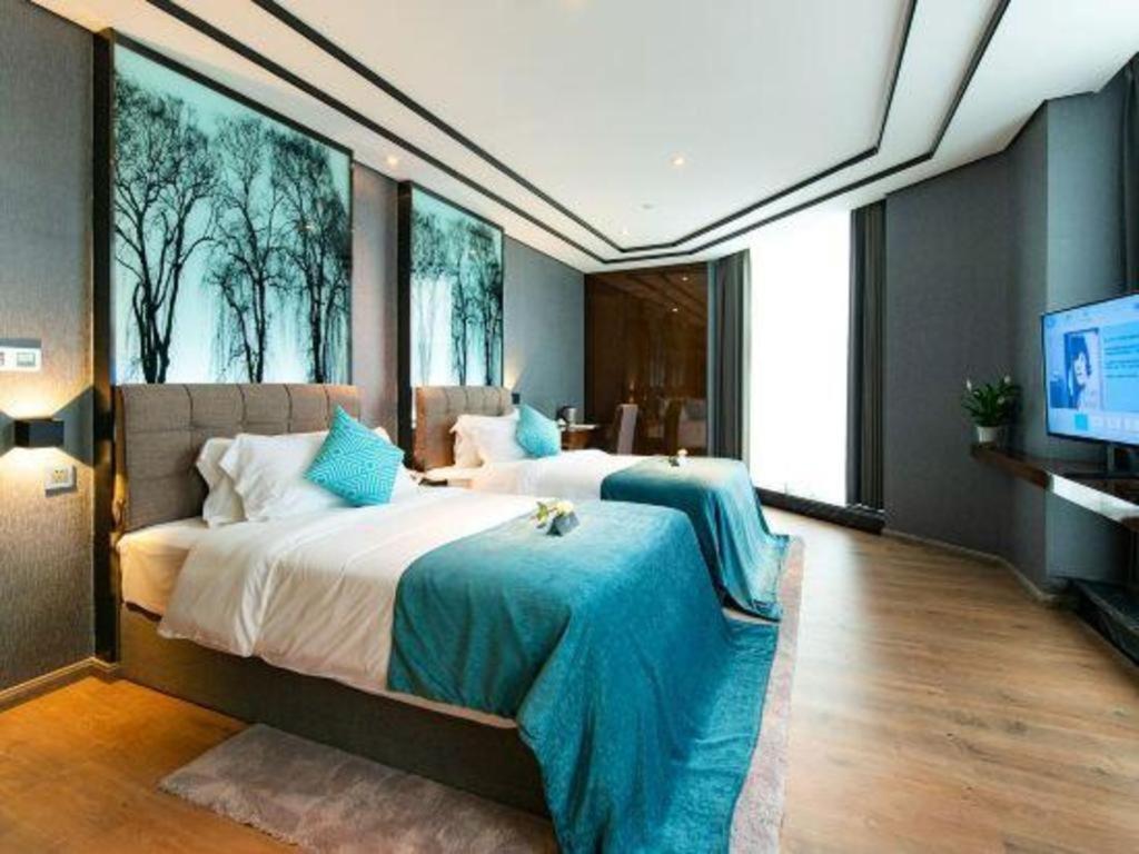 Xana Hotelle-Hotel Luzhou Baizitu Square Exterior foto